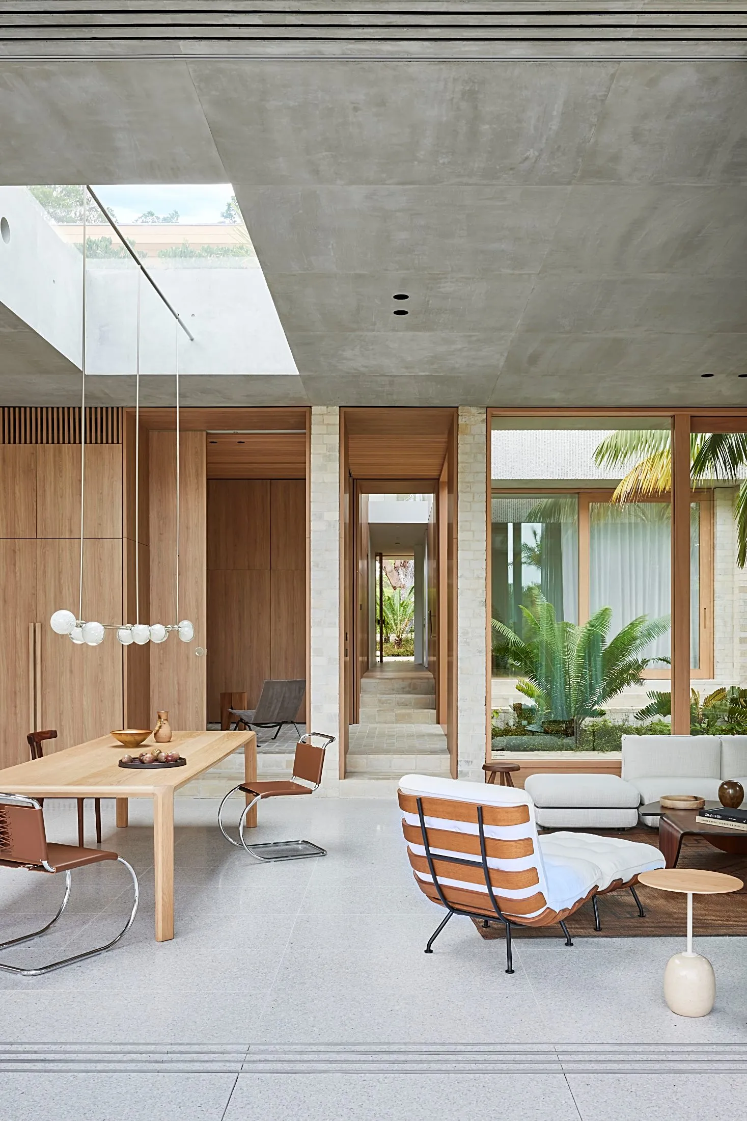 Dining room with timber wall joinery, skylight and garden outlook, Freshwater
